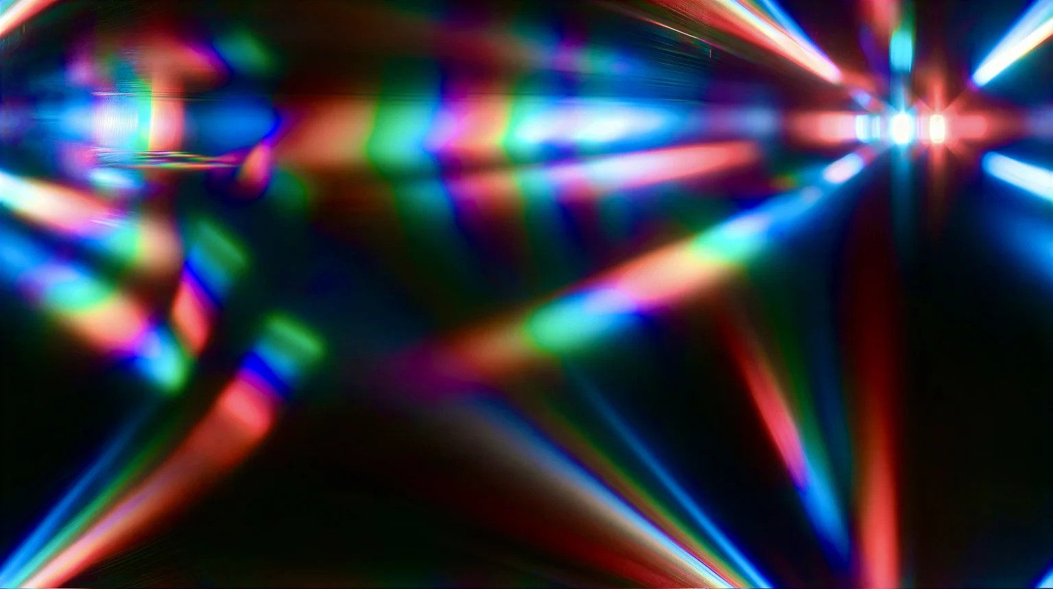 Abstract blurry multicolored neon light trails crossing a black background